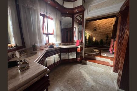 Casa à venda com 416m², 4 quartos e 2 vagasBanheiro