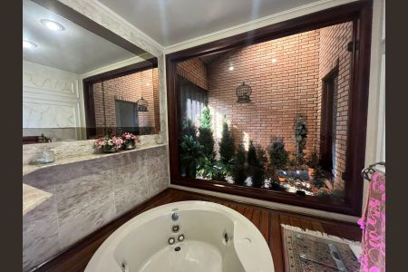 Casa à venda com 416m², 4 quartos e 2 vagasBanheiro