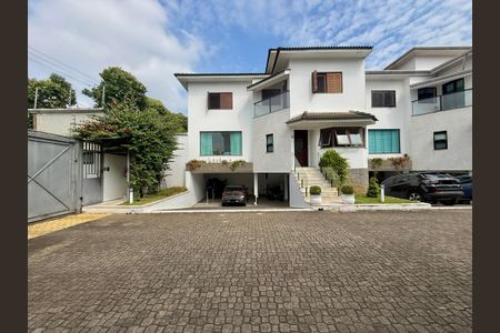 Casa de condomínio à venda com 397m², 4 quartos e 4 vagasFachada Casa