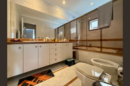 Casa de condomínio à venda com 397m², 4 quartos e 4 vagasBanheiro Suíte 1