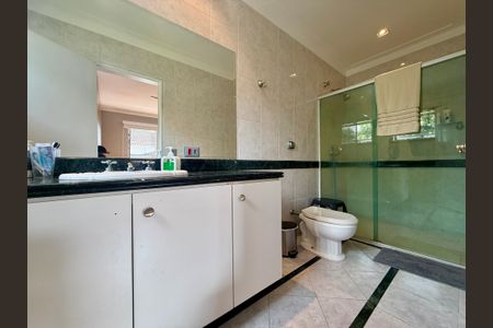 Casa de condomínio à venda com 397m², 4 quartos e 4 vagasBanheiro Suíte 2