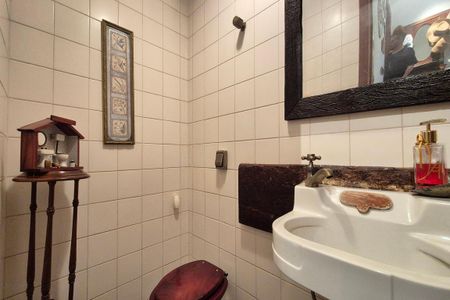 Casa de condomínio para alugar com 398m², 4 quartos e 4 vagasLavabo 