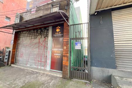 Studio para alugar com 32m², 1 quarto e sem vagaFachada + plaquinha