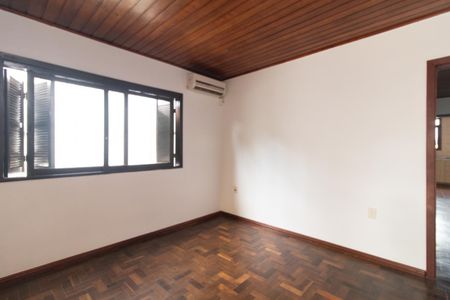 Sala de casa à venda com 3 quartos, 145m² em Vila Nova, Porto Alegre