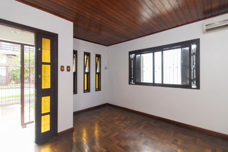 Sala de casa à venda com 3 quartos, 145m² em Vila Nova, Porto Alegre