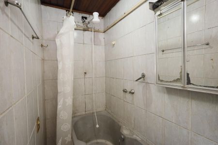 Casa à venda com 448m², 3 quartos e 3 vagasBanheiro da Suíte 1