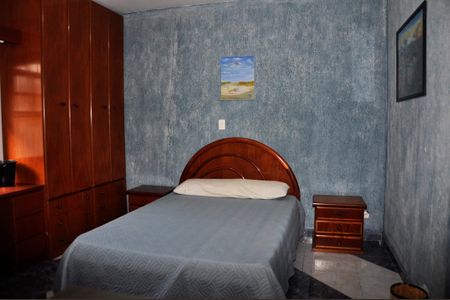 Casa para alugar com 559m², 4 quartos e 10 vagasDetalhe - Quarto 03 com Suíte