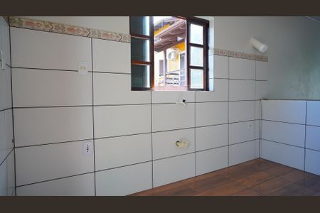 Casa para alugar com 70m², 2 quartos e 2 vagasCozinha 