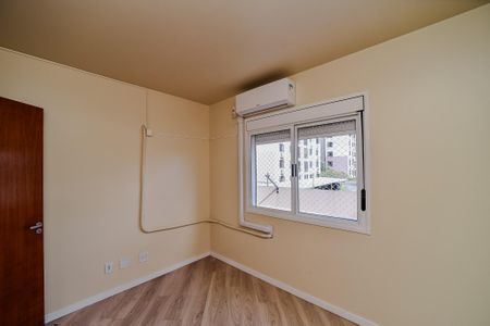 Quarto 1 de apartamento para alugar com 2 quartos, 55m² em Sarandi, Porto Alegre