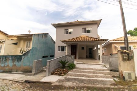 Casa de condomínio para alugar com 230m², 4 quartos e 2 vagasFachada