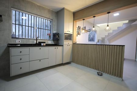 Casa à venda com 95m², 2 quartos e 2 vagas Casa à venda com 95m², 2 quartos e 2 vagasCozinha