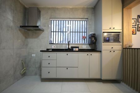 Casa à venda com 95m², 2 quartos e 2 vagas Casa à venda com 95m², 2 quartos e 2 vagasCozinha