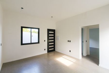 Casa à venda com 50m², 2 quartos e 2 vagas Casa à venda com 50m², 2 quartos e 2 vagasSala/Cozinha