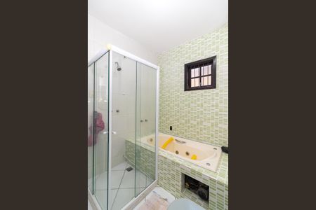 Casa à venda com 330m², 3 quartos e 4 vagasBanheiro da Suíte 1