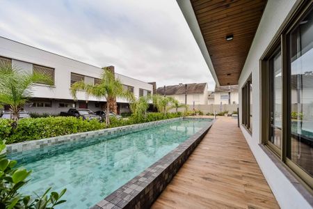 Casa de condomínio à venda com 180m², 3 quartos e 2 vagasÁrea comum - Piscina