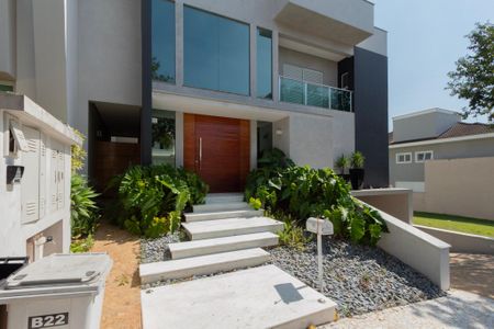 Casa de condomínio para alugar com 441m², 4 quartos e 4 vagasFachada