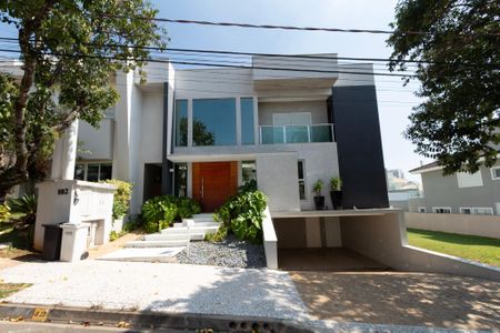 Casa de condomínio para alugar com 441m², 4 quartos e 4 vagasFachada
