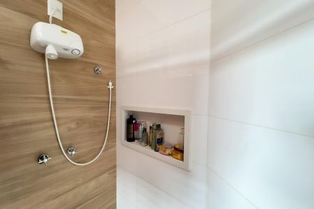 Casa de condomínio para alugar com 305m², 3 quartos e 5 vagasBanheiro da Suíte 1