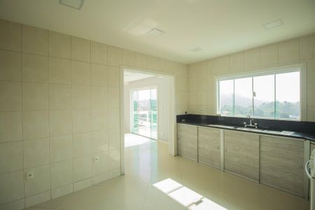 Casa de condomínio para alugar com 240m², 4 quartos e 4 vagasCozinha