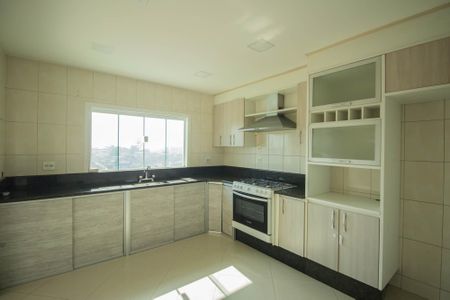 Casa de condomínio para alugar com 240m², 4 quartos e 4 vagasCozinha