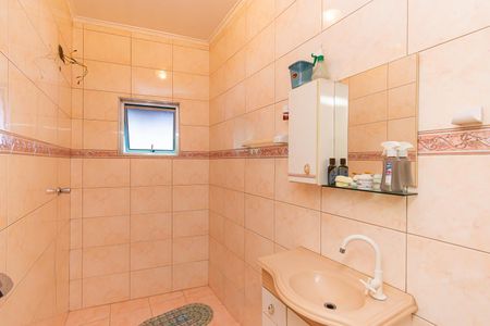 Casa à venda com 340m², 4 quartos e 6 vagasBanheiro da Suíte 1