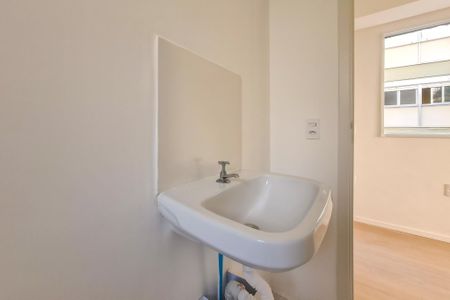 Banheiro de kitnet/studio à venda com 1 quarto, 25m² em Jardim Paulista, São Paulo