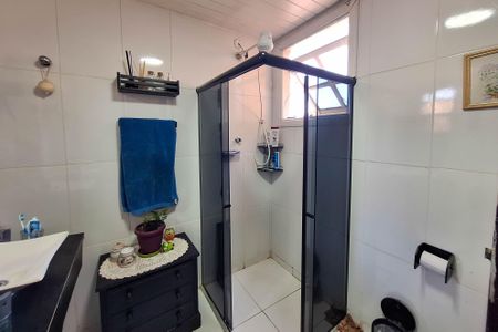 Casa de condomínio à venda com 235m², 4 quartos e 2 vagasBanheiro da Suíte 2