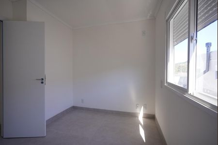 Quarto 2 de casa de condomínio para alugar com 2 quartos, 60m² em Vila Nova, Porto Alegre