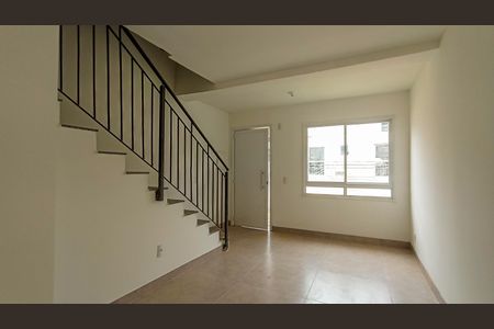 Sala  de casa de condomínio para alugar com 2 quartos, 60m² em Vila Nova, Porto Alegre