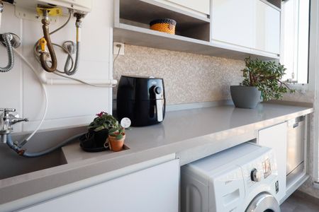 Apartamento à venda com 64m², 2 quartos e 2 vagasCozinha e Área de Serviço
