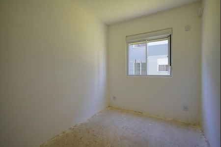 Quarto 1 de apartamento para alugar com 2 quartos, 90m² em Guarujá, Porto Alegre