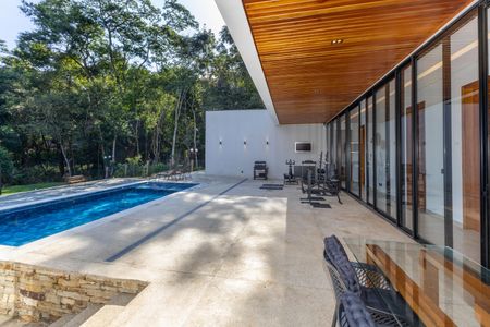 Casa de condomínio à venda com 320m², 4 quartos e 4 vagas Casa de condomínio à venda com 320m², 4 quartos e 4 vagasÁrea da Piscina