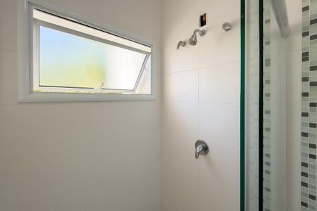Casa de condomínio para alugar com 250m², 3 quartos e 4 vagasBanheiro da Suíte 3