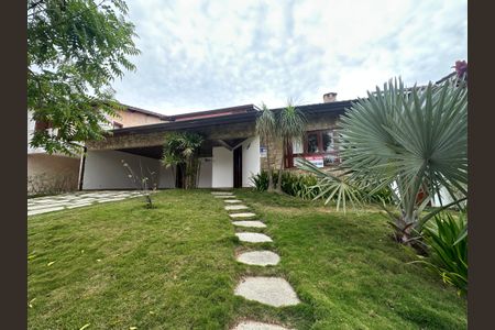 Casa de condomínio para alugar com 375m², 4 quartos e 4 vagasFachada