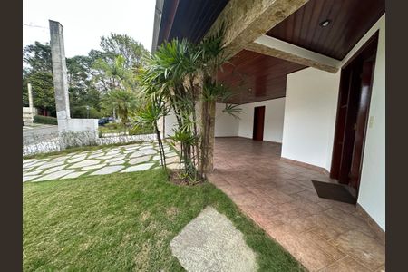 Casa de condomínio para alugar com 375m², 4 quartos e 4 vagasFachada