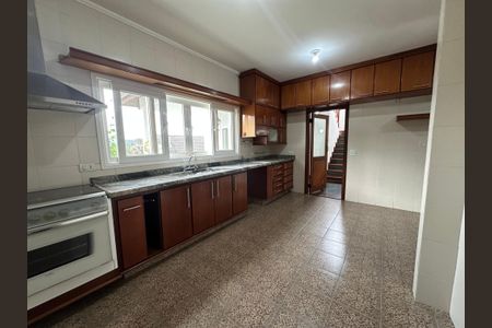 Casa de condomínio para alugar com 375m², 4 quartos e 4 vagasCozinha