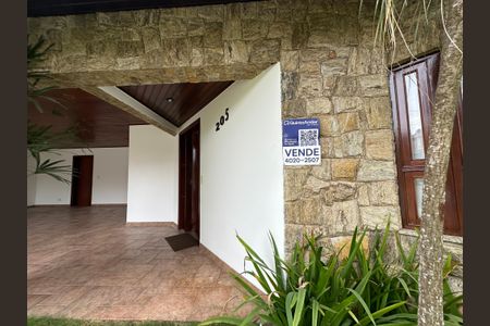 Casa de condomínio para alugar com 375m², 4 quartos e 4 vagasFachada