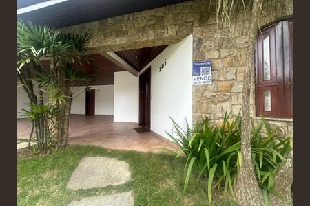 Casa de condomínio para alugar com 375m², 4 quartos e 4 vagasFachada