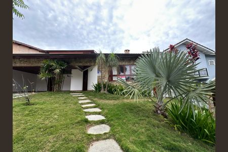 Casa de condomínio para alugar com 375m², 4 quartos e 4 vagasFachada