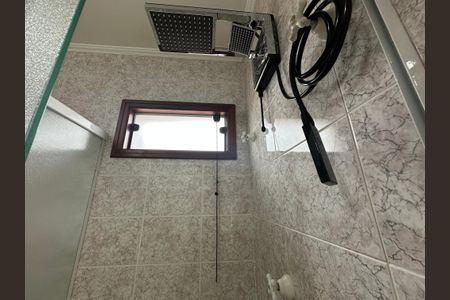 Casa de condomínio para alugar com 375m², 4 quartos e 4 vagasBanheiro da Suíte 2