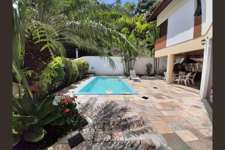 Casa de condomínio à venda com 378m², 4 quartos e 4 vagas