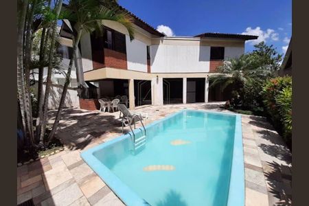 Casa de condomínio à venda com 378m², 4 quartos e 4 vagas
