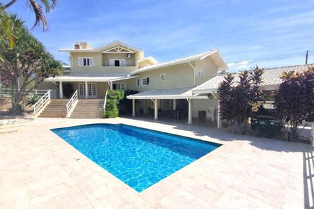Casa de condomínio à venda com 550m², 4 quartos e 4 vagas