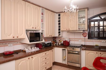 Casa para alugar com 400m², 5 quartos e 6 vagasCozinha 1