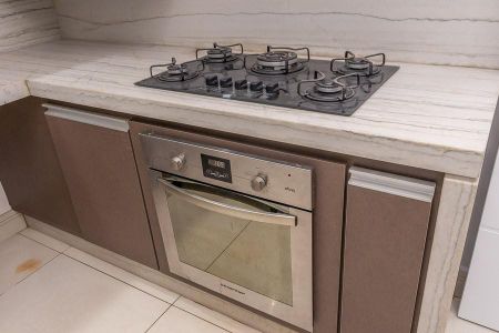 Casa de condomínio para alugar com 320m², 3 quartos e 4 vagas Casa de condomínio para alugar com 320m², 3 quartos e 4 vagasDetalhe Cozinha-Forno Elétrico e cooktop