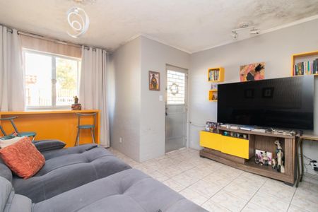 Sala de casa à venda com 4 quartos, 126m² em Vila Nova, Porto Alegre