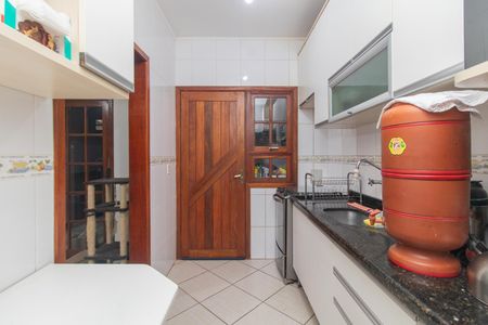 Casa de condomínio à venda com 164m², 4 quartos e 2 vagasCozinha e Área de Serviço