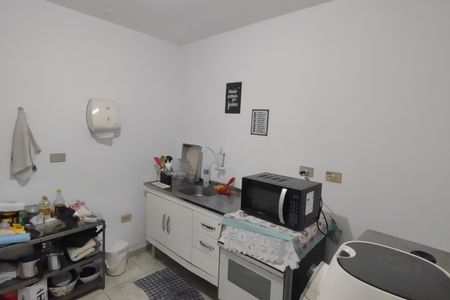 Casa à venda com 147m², 2 quartos e 2 vagas Casa à venda com 147m², 2 quartos e 2 vagasCozinha