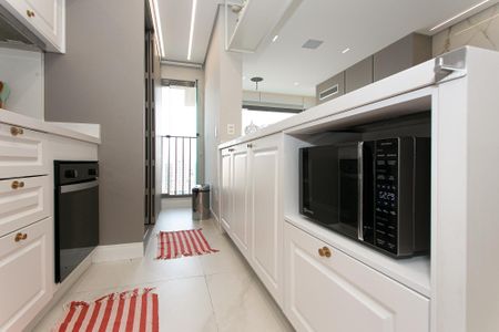 Apartamento à venda com 64m², 2 quartos e 1 vaga Apartamento à venda com 64m², 2 quartos e 1 vagaCozinha - Microondas