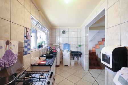 Casa à venda com 65m², 3 quartos e 2 vagas Casa à venda com 65m², 3 quartos e 2 vagasCozinha e Área de Serviço